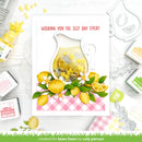 Card with lemon-themed design and text 'Wishing you the zest day ever!' surrounded by stamping supplies.
