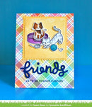 Card with cartoon cats and 'friends' text on a colorful plaid background