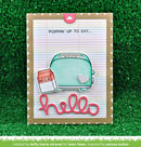 Card with a toaster and milk carton design on lined paper with 'hello' text, against a green grass background.