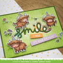 Birthday card with cartoon bulls and text on a green background