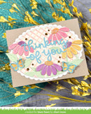 Card with floral design and 'thinking of you' text on a floral background