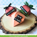 Decorative candy with 'You're so sweet' text on a wooden surface