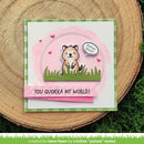 Card with a quokka design and text 'You quokka my world!' on a wooden surface.