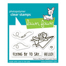 Lawn Fawn photopolymer clear stamps with a deer, airplane, and 'hello' text on a blue background.