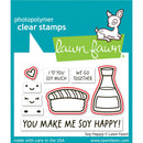 Lawn Fawn photopolymer clear stamps set with cartoon deer and food-themed stamps on a blue background.
