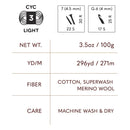 Yarn label with specifications including weight, length, fiber type, and care instructions.