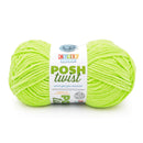Neon green yarn ball with a label on a white background