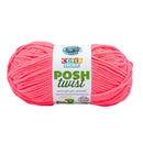 Pink skein of yarn with a 'Cover Story' label on a white background
