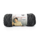 Ball of gray yarn with Lion Brand label on a white background