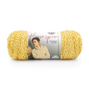 Yellow yarn skein with Lion Brand label on a white background