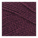 Close-up of a ball of dark purple yarn