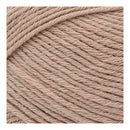 Close-up of beige yarn with a textured pattern