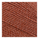Close-up of brown yarn with a textured pattern