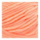 Close-up of bright pink yarn with a textured surface.