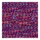 Close-up of textured purple fabric with a woven pattern
