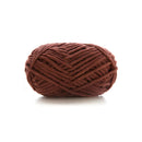 Brown skein of yarn on a white background