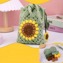 Crocheted bag with sunflower design on a pink and yellow background