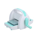 White and turquoise Die cutting and embossing cutter on a white background