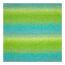 Gradient pattern of green and blue stripes on a textured fabric background