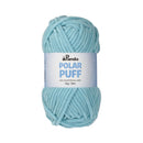 Light blue skein of yarn with a label on a white background