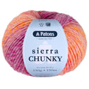 A ball of Patons Sierra Chunky yarn with a variegated color pattern of pink, orange, and yellow, featuring a white paper label with black text.