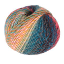 A single ball of variegated yarn with blended colors of teal blue, pink, orange, yellow, and dark brown on a plain white background.