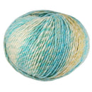 Ball of yarn with blue and beige colors on a white background