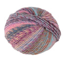 A ball of variegated yarn with blended pastel pink, purple, blue, and beige tones, isolated on a white background.