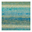 A close-up of a knitted fabric texture with horizontal stripes in shades of blue, teal, and cream.