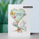 Card with cartoon animals and heart-shaped tree, featuring 'Penny Black' branding.