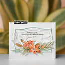 Greeting card with floral design and text, featuring Penny Black branding, on a blurred plant background.
