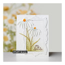 Card with floral design and 'Penny Black' branding on a blurred floral background