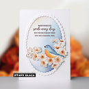 Card with a blue bird and flowers design, featuring a motivational quote, on a white background.