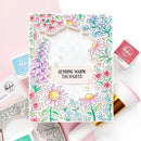 Floral card with 'Sending Warm Thoughts' text on a pink background with rubber stamps.
