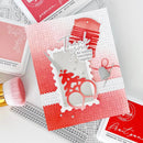 Card with red and white design featuring a reindeer and 'Thank you' text, surrounded by crafting tools on a light gray background.