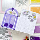 Greeting card with purple door illustration and floral text on a decorative background