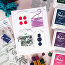 Stamp set with 'From the Heart, for you' text and various stamping supplies on a pink background