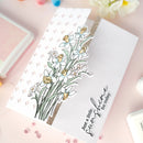 Card with floral design and text on a pink background