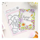 Clear stamp set with floral design and text on a white background