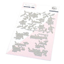 Sheet of silver floral and script cutouts on a pink background