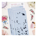 Set of floral and paw print stencils on a light blue background with decorative elements.