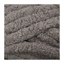 Stack of gray textured towels on a white background