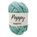 Turquoise skein of yarn with a 'Poppy Crafts' label on a white background