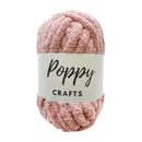 Ball of pink yarn with 'Poppy Crafts' label on a white background