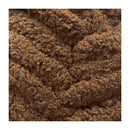 Close-up of brown textured yarn ball