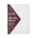 Packaging of Misty White Blossoms paper with a brown patterned flap on a white background