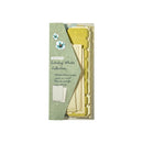 Packaged stationery set with green and gold design on a white background
