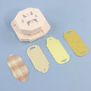 Paper punch with cut-out shapes on a blue background