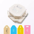 Cardstock punch with measurements and sample punched cards on a white background
