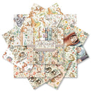 Collection of patterned paper sheets with animal illustrations on a white background